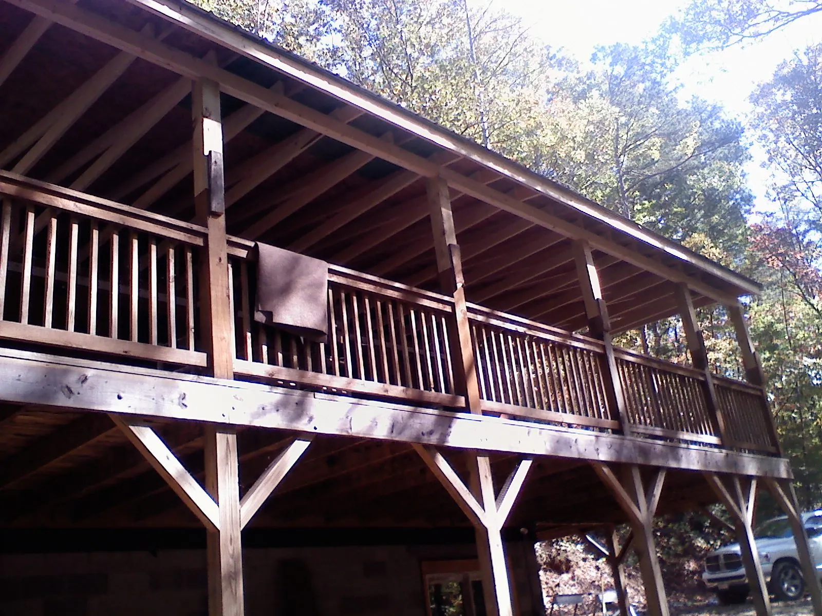 Timber framing under a new elevated porch and deck — Roof Leak Repair in Hallstead by Roofing Brothers